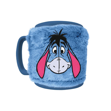 A ceramic mug with Eeyore artwork from Winnie the Pooh, featuring a blue fluffy removeable cozy cover.