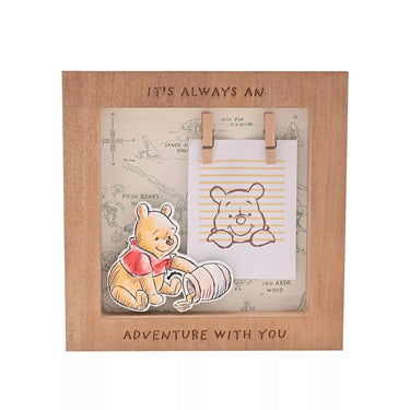Wooden photo frame with Winnie the Pooh design and text 'It's always an adventure with you' on a white background.