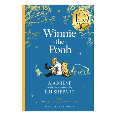Winnie-the-Pooh book cover with blue background and gold accents