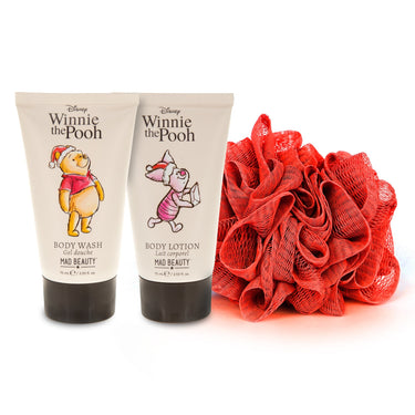 Two Disney Winnie the Pooh body care products and a red loofah on a white background