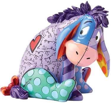 A colorful resin figurine of Eeyore from Britto's Pop art collection, featuring a stylized design with a heart on Eeyore's back.