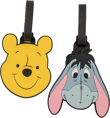Two cartoon character luggage tags, one yellow and one gray with pink ears, on a white background.
