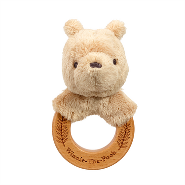 Plush bear with wooden ring featuring 'Winnie-The-Pooh' branding on a white background