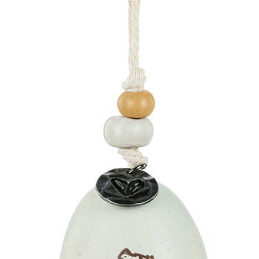 Close up of Demdaco Winnie the Pooh Self Care Bell 