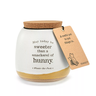 A white ceramic jar with a cork lid, featuring an illustration of Winnie the Pooh characters and the text 'May today be sweeter than a smackerel of hunny.' 