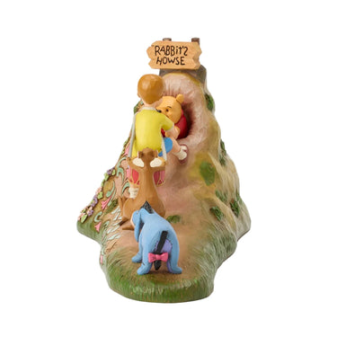 Animated character figurine with a house labeled 'Rabbit's House' on a white background