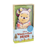 Packaging of Disney Winnie the Pooh Hugs with cartoon character on a white background