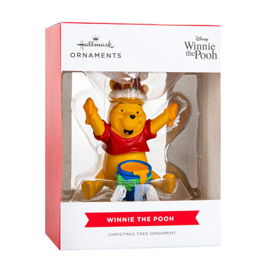 Winnie the Pooh Christmas ornament in packaging with Hallmark and Disney branding.