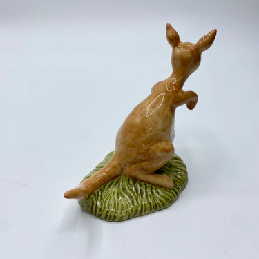 Ceramic kangaroo figurine on a white background