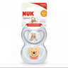 Packaging of NUK Space silicone soother with a design of Winnie the Pooh, suitable for 0-6 month old babies.
