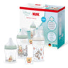 NUK baby bottles with Disney baby design in front of NUK packaging