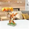 Decorative figurine of a lion on a shelf with a blurred background