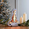 Tigger Infinity Light surrounded by Christmas decor