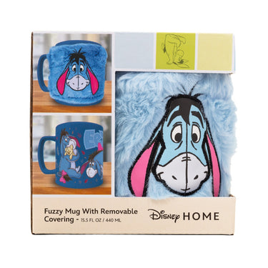 Fuzzy mug with removable covering from Disney Home, featuring Eeyore design, in packaging.
