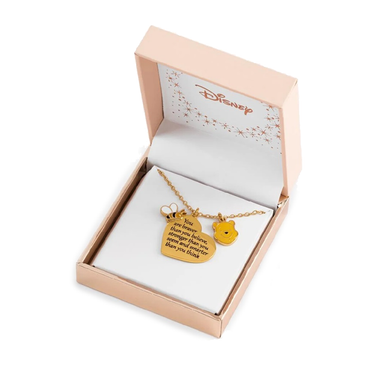 Gold necklace with heart-shaped pendant and bear charm in a Disney box