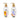 Two Mad Beauty Disney Winnie Pooh hand care products on a white background: a hand cream bottle with a yellow bear illustration and a hand wash bottle with a blue and orange animal illustration, both with gold pump dispensers.