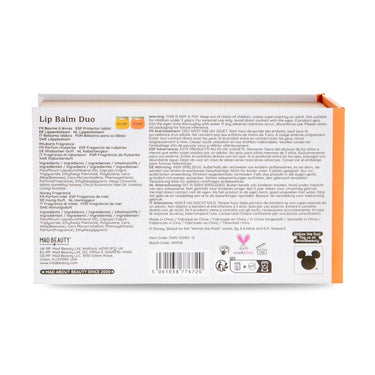 The back of a Mad Beauty Lip Balm Duo box, showing detailed product information, ingredients, warnings, and barcodes on a white background with a small orange tab visible on the right.
