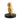 Gold bear figurine on a dark base with a white background