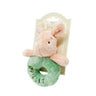 A plush fabric Piglet ring rattle toy from the Hundred Acre Wood series, attached to a green ring, with a card header.